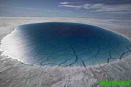 A huge lake of melt water on top of a Greenland Glaier The melting glaciers are fuelling sea level rise